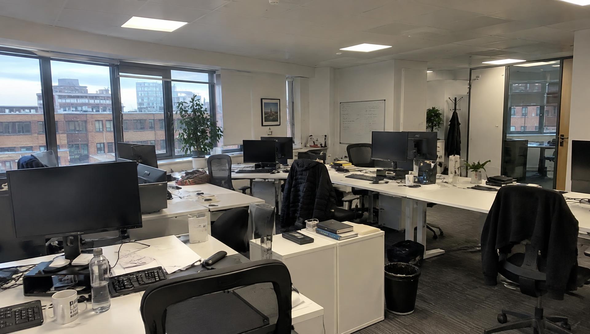 Interior of a modern London office overlooking the city skyline
